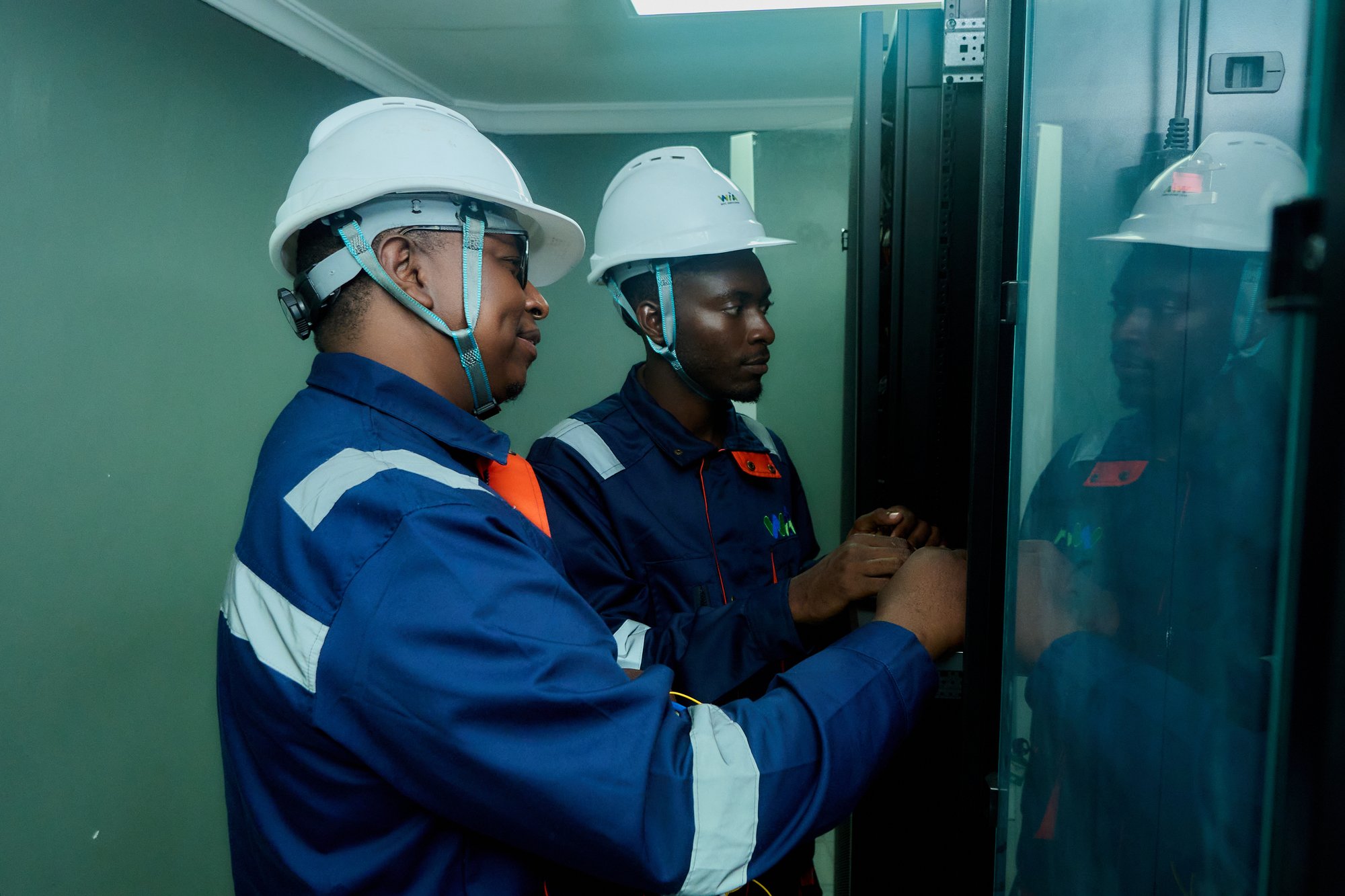 WiA technicians working together in Tanzania